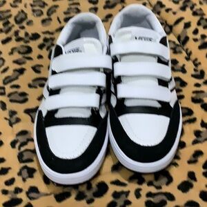 #231 Vans black and white leather Velcro  big boys Sz 4.5 & W 6.5 NWOT